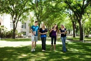 10559817 - students walking through campus visiting